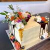 Double high square cake with flowers