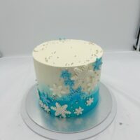 Tall Frosty Snow Flake Cake