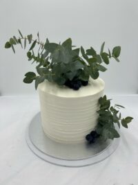 Plain Texture Cake With Eucalyptus Arrangement